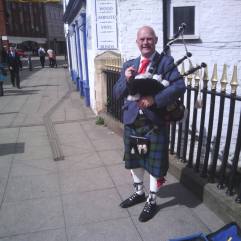 Andy busking in Southgate this afternoon (Tuesday 5th May). The sound of his pipes echoed around the town.